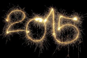New Year 2015 formed from sparking digits over black background