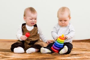 children-sharing-toy-120307